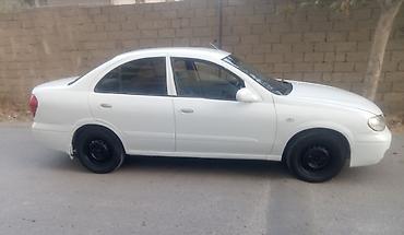 4 göz maşın: Nissan Sunny: 1.6 l | 2004 il Sedan — 10