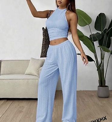 Kompleti: Ženski komplet – top bez rukava + široke pantalone. - Top: pripijena na lalafo.rs — 3 Kompleti: Ženski komplet – top bez rukava + široke pantalone. - Top: pripijena — 3
