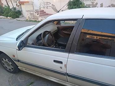 rezistor: Peugeot Pars sedan – ağ rəng, 4 qapı, öndən‑çəkişli. Xüsusiyyətlər: - — 2