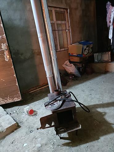 Sobadan və qaz yandırıcısından ibarət çoxfunksiyalı metal soba -