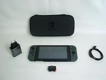 Nintendo Switch: Uz konzolu dolazi: Tablet (konzola) Joy-Con džojstici Punjač — 5