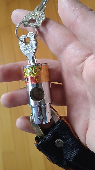 Velosiped aksesuarları: Dəmir velosiped və skuter üçün zincir kilit.Şəkildə orjinal hologramı — 2