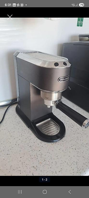 vozol pod: Delonghi espresso/kofe aparatı – kompakt, paslanmayan polad və qara — 2