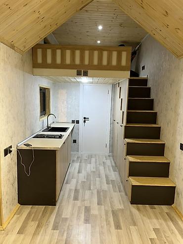 Konteynerlər: Modul tipli mobil ev – “tiny house” Xüsusiyyətlər: - Daşınan — 1