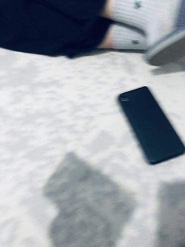 Мобильные телефоны: Смартфон Xiaomi Redmi (серия Redmi, задняя крышка с логотипом Redmi) — 7