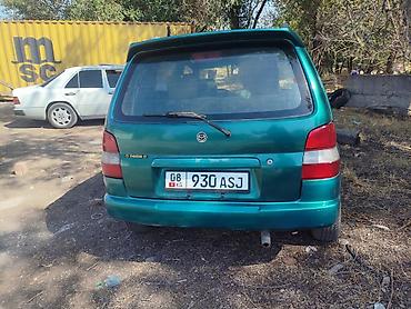 акумляторный гайкаверт: Mazda Demio: 1999 г., 1.3 л, Механика, Бензин, Хэтчбэк — 7