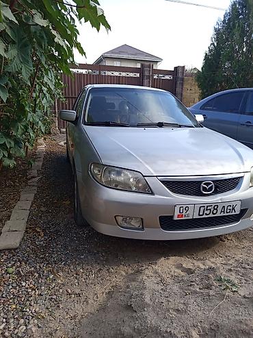 Mazda Familia: 2001 г., 1.5 л, Механика, Бензин, Седан