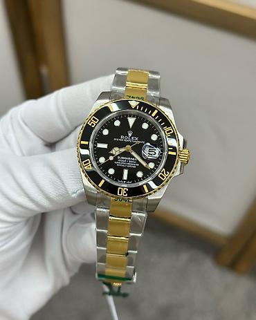 oyster saat: *Rolex Submariner* Mexanizm: Avtomexanika (Avtomatik) Şüşə — 1
