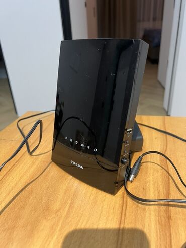 тюнер для телевизора купить: Беспроводной маршрутизатор TP-Link. Особенности и порты: - 1 порт WAN