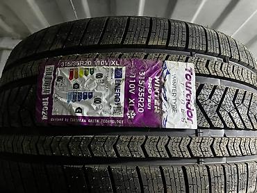 35: Зимняя китайская шина. Размер задних 315/35R20 передние 275/40R20 — 3