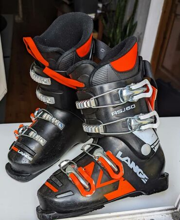 черная форма: Лыжные ботинки б/у,но очень хорошем состоянии, 60я жёсткость,4х
