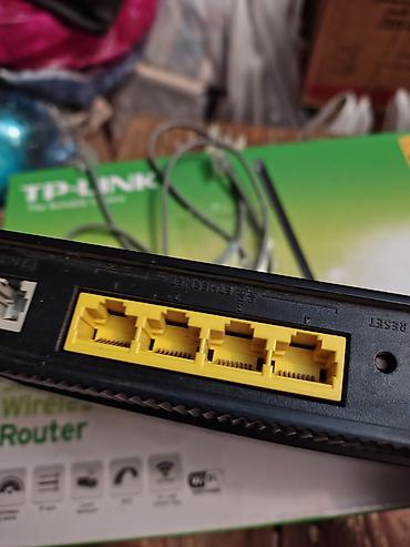 balaca printer: TP-Link simsiz marşrutlaşdırıcı + Pirelli PRG A1010 modem Məhsul — 2