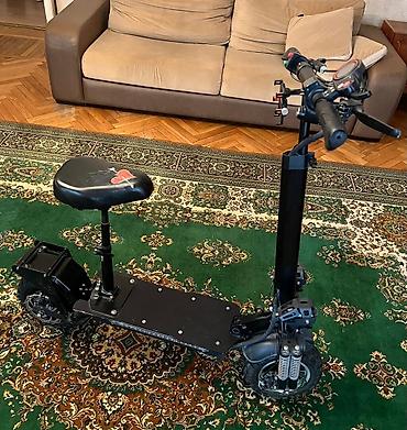 Электротранспорт: Elektrik skuter – oturacaqlı, güclü asqılı və geniş platformalı, 60 km — 1