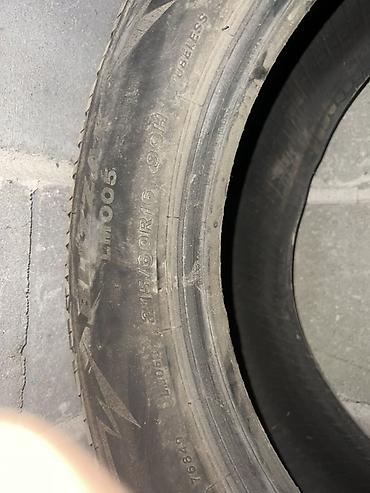 Зимние шины Bridgestone Blizzak DM-V2 (на боковине видна серия