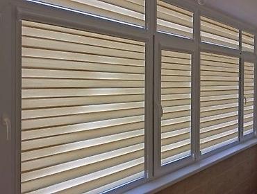 Жалюзи и рольшторы: Рулонные шторы с горизонтальными полосами предлагают современное и — 8