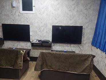 kiçik televizor: İkirədli oyun və əyləncə guşəsi – PlayStation konsolu və iki böyük — 1