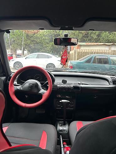bmw e 38: Nissan Micra (K11) hetçbek, 3 qapı, boz rəng. - Yığcam şəhər — 6