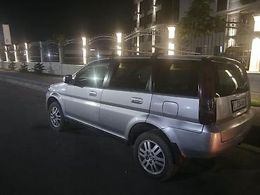 Другие автомобили: Минивэн/кроссверсал серебристого цвета с пятидверным кузовом. Кузов и — 2
