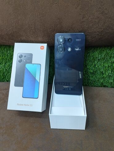 realme note 50 qiymeti: Xiaomi Redmi Note 13 modeli, qara rəngdə təqdim olunan, arxa tərəfində