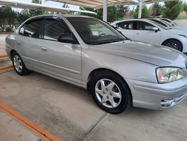 Hyundai: Hyundai Elantra: 1.6 l | 2004 il Sedan — 1