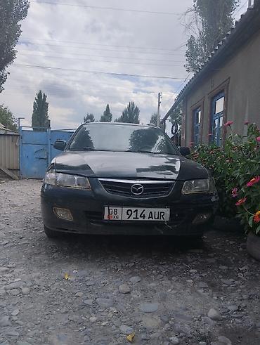 стёк: Mazda 626: 2000 г., 2 л, Механика, Бензин, Универсал — 8