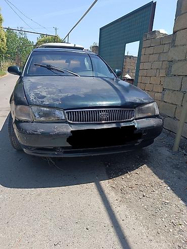 азербайджан авто: Kia Clarus sökülüb satılır– ön görünüşlü foto. Xüsusiyyətlər: - — 1