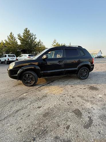 islenmis hyundai avtomobilleri satisi: Hyundai Tucson, qara rəng, Azərbaycan nömrə nişanı 10-US-736 — 2