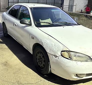 нексия черный: Hyundai Lantra: 1996 г., 1.6 л, Механика, Бензин, Седан — 3