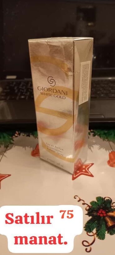 Ətriyyat: Oriflame brendinin "Dancing Lady Hypnotic Night" ətri. Bu ətir 50 ml — 36