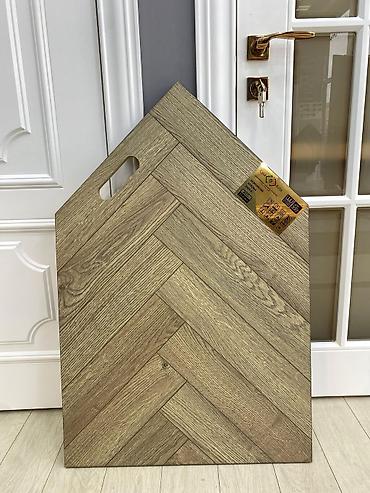balaca yolkalar: Herringbone dizaynlı döşəmə örtüyü – taxta fakturalı laminat panel - — 1