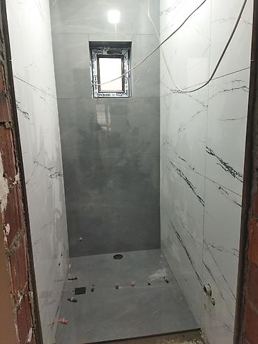 Plitə işləri: Keramik plitə döşənməsi və kafel-metlax işləri Xidmət təsviri: - — 26