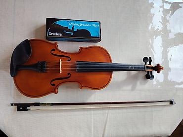 Skripkalar: Skripka dəsti Tərkib: - Tam ölçülü klassik skripka (4/4) - Yay - — 1
