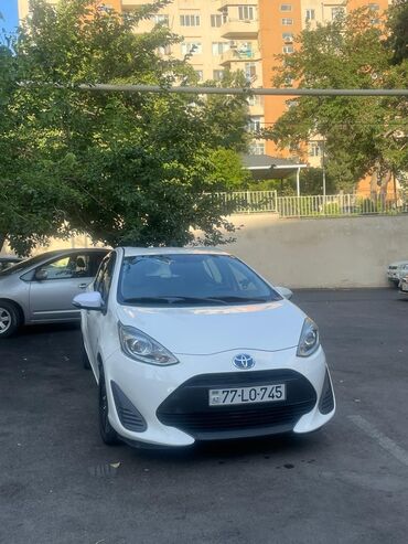 бампера гольф 2: Toyota Prius: 1.5 л | 2018 г. Седан
