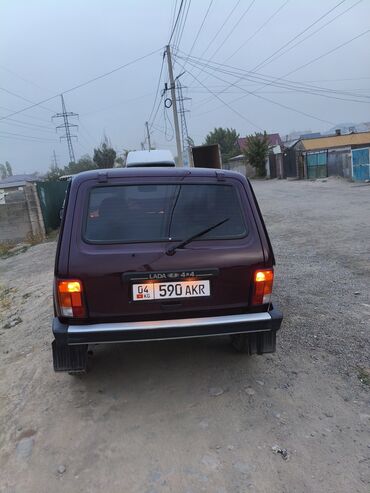 купить двигатель на мотоблок 7 л с: LADA 4x4 (трёхдверная «Нива»), бордовый цвет. Основные особенности: -