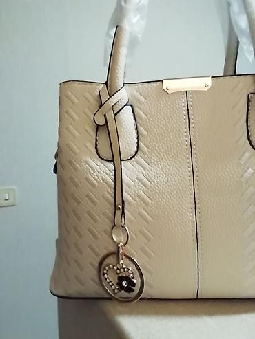 caprice koferi: Nova prelepa bež tašna dužine 30cm i visine 22cm. 3 pregrade unutra — 2