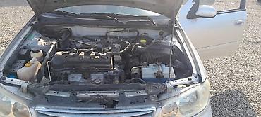 motor bmw: Nissan Sunny: 1.3 l | 2008 il Sedan — 10