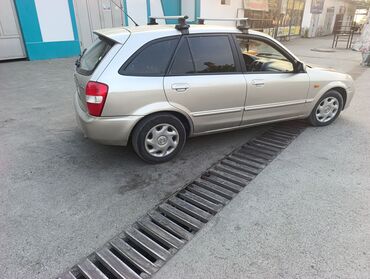 авто в рассрочку без первоначального взноса: Mazda 323: 2000 г., 0.1 л, Механика, Бензин, Хэтчбэк