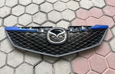 Бамперы и комплектующие: Накладка на бампер Передний Mazda, Б/у, Оригинал
