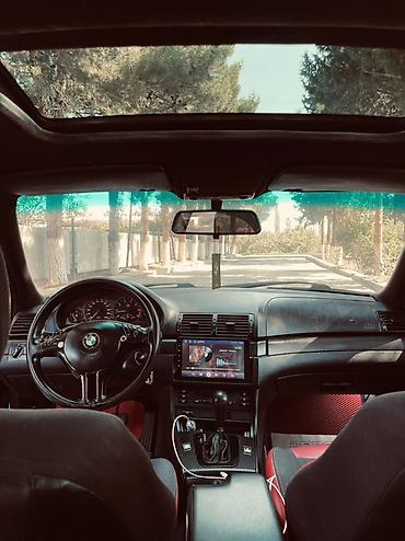 toyota corolla cross: BMW 3 series: 2.5 l | 1999 il Sedan — 3