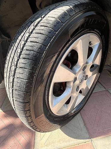 masin cip: Nissan Sunny: 1.6 l | 2008 il Sedan — 7
