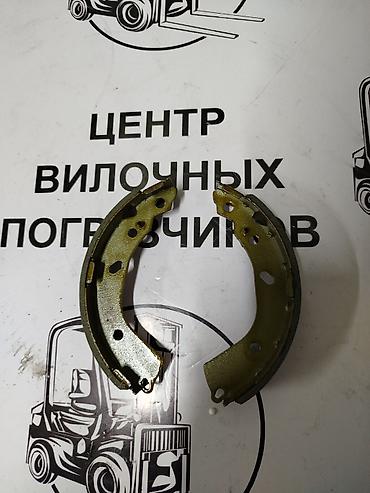 колодки на погрузчик: Тормозные колодки барабанные для вилочного погрузчика. - Тип — 1
