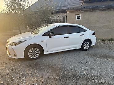 Toyota Corolla: 2023 г., Гибрид, Седан