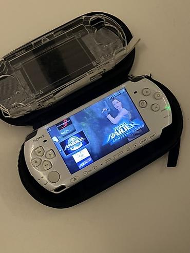 playstation satilir: Sony PSP 3000 (PlayStation Portable) – ağ rəng Tərtəmizdir, üzərində — 4