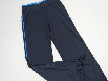 Nike, Material trousers for women, size M (EU 38)