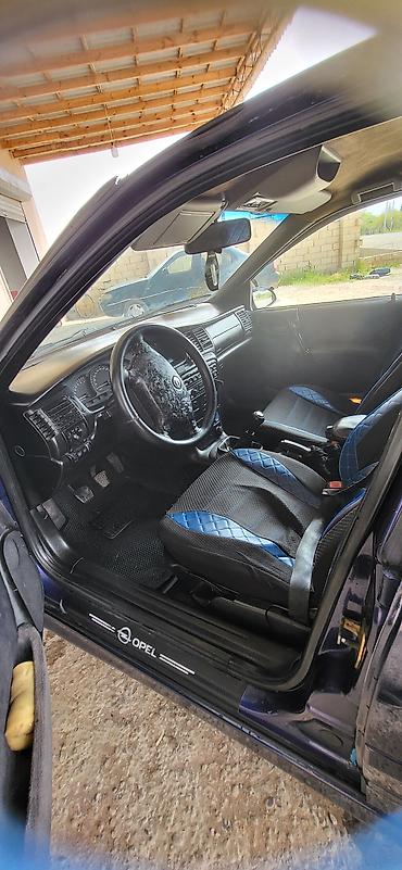 Opel: Opel Vectra B sedan - Kuzov: 4 qapılı sedan, tünd göy rəng - Mühərrik — 11