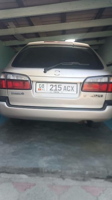 e6 3: Mazda 626: 1999 г., 1.8 л, Механика, Бензин, Универсал — 1