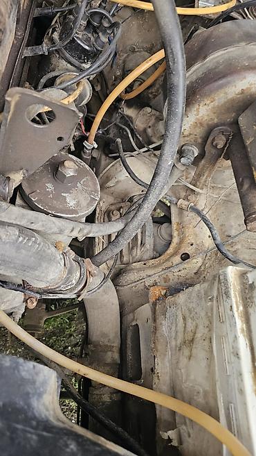 QAZ: QAZ 3110: 2.4 l | 1998 il Sedan — 22