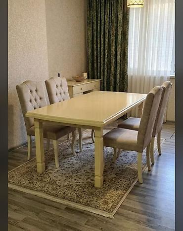 Masa dəsti 6 stulla 400₼. Stullar heç işlənməyib. Masa açılır. Ünvan