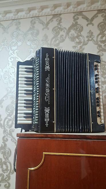 qarmon: Qarmon, Akustik, İşlənmiş, Ünvandan götürmə — 1