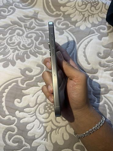 oppo reno 13: IPhone 15 Pro Max, титановый корпус (Natural Titanium). Модель — 3